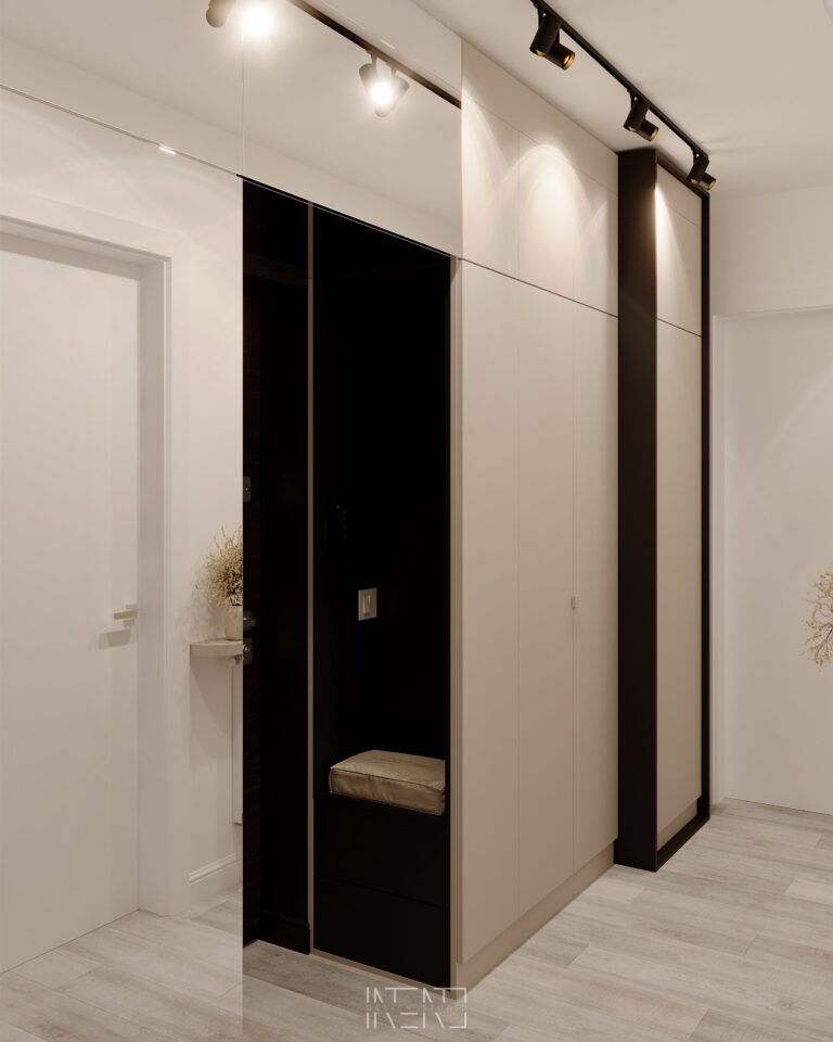 Hallway with tall greige wardrobes, a dark niche with a padded bench, a full-height mirror and black track spotlights