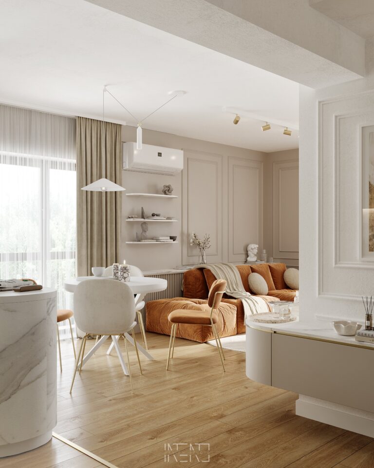 Living area seen from the hallway: caramel velvet sofa, white floating shelves on beige panelled walls and the dining table by the window