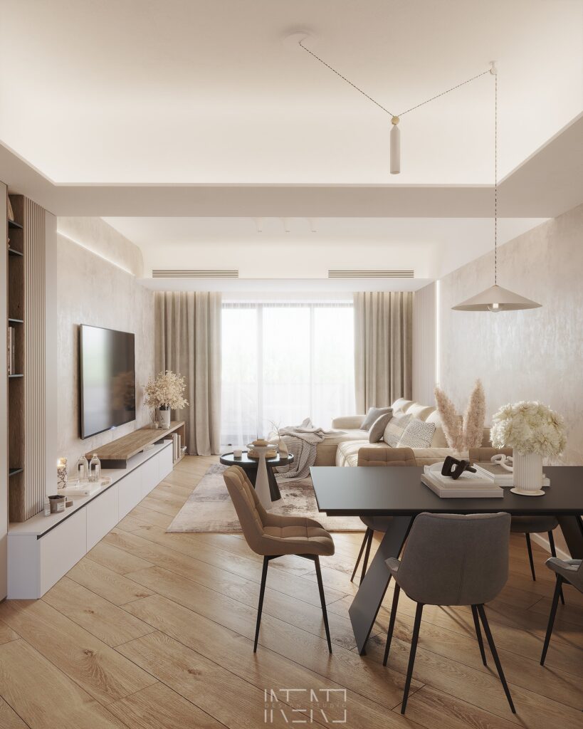 Livingul văzut de la masa de dining spre fereastră, cu canapea crem de colț, comodă TV joasă și draperii lungi