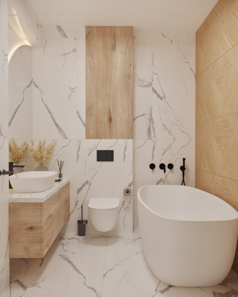 Baia văzută în întregime: mobilier din stejar, vas WC suspendat, cadă freestanding, pereți cu aspect de marmură și panou cu efect de lemn