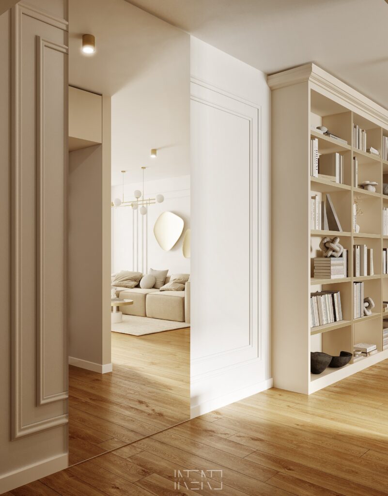 Randare a holului cu bibliotecă crem și perete cu oglindă în care se reflectă livingul cu canapea bej
